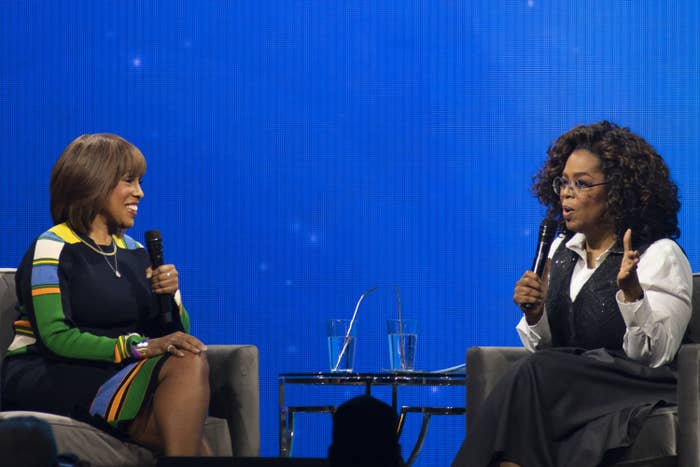 Photo of Oprah and Gayle King speaking on a panel
