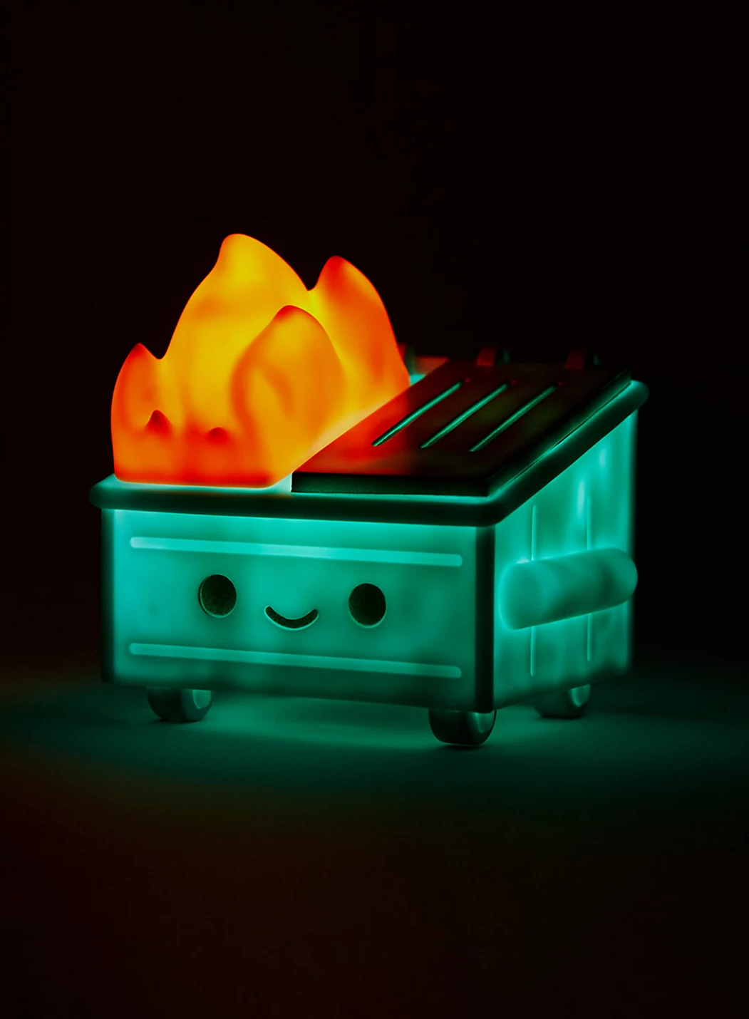 glowing smiling dumpster with fire coming out of it