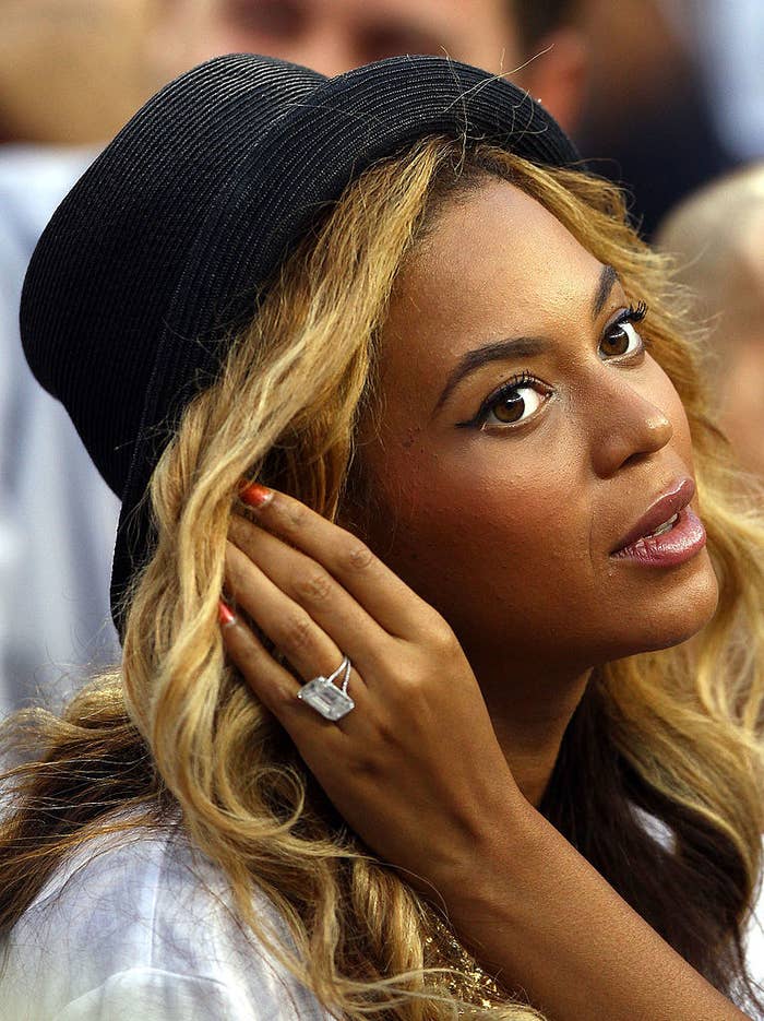 Beyonce at an event with a large emerald cut ring