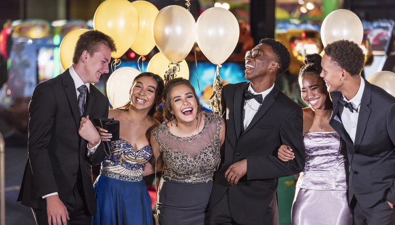 Teenagers at prom laughing
