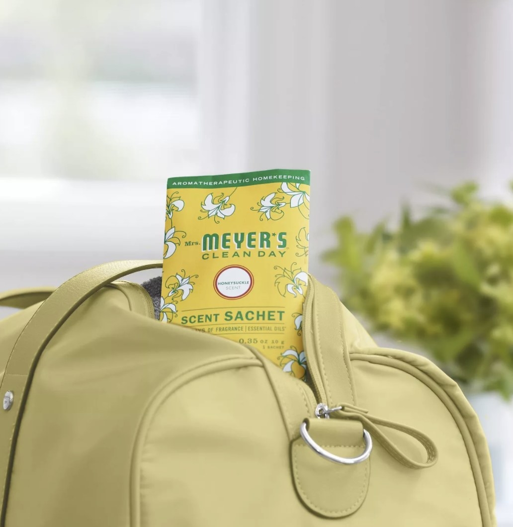 The yellow and green sachet has a floral design and says &quot;MRS. MEYER&#x27;S CLEAN DAY SCENT SACHET&quot;