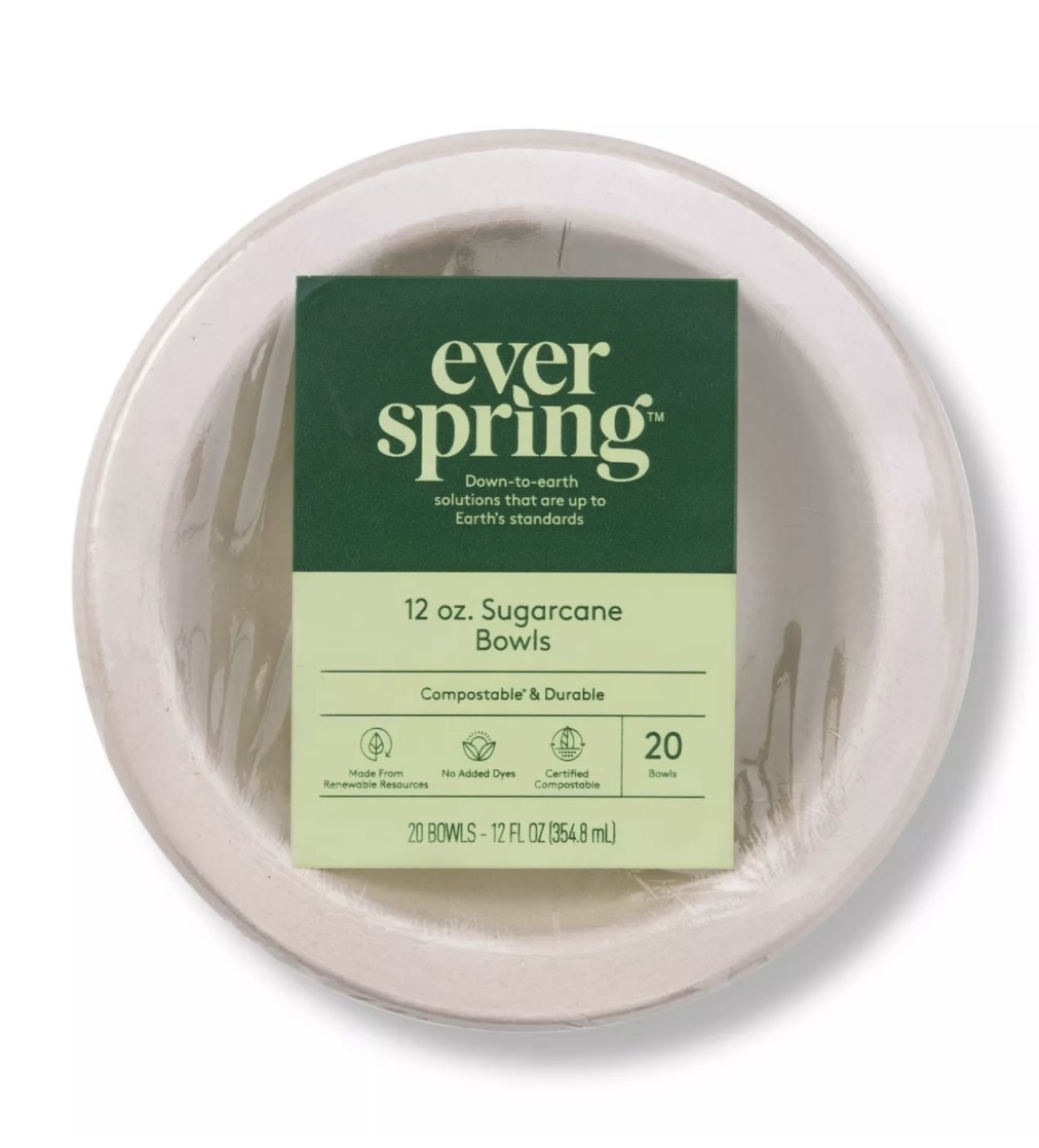 The neutral-colored bowels are in a stack with clear wrapping and a green tag duo-toned that says &quot;everspring&quot;