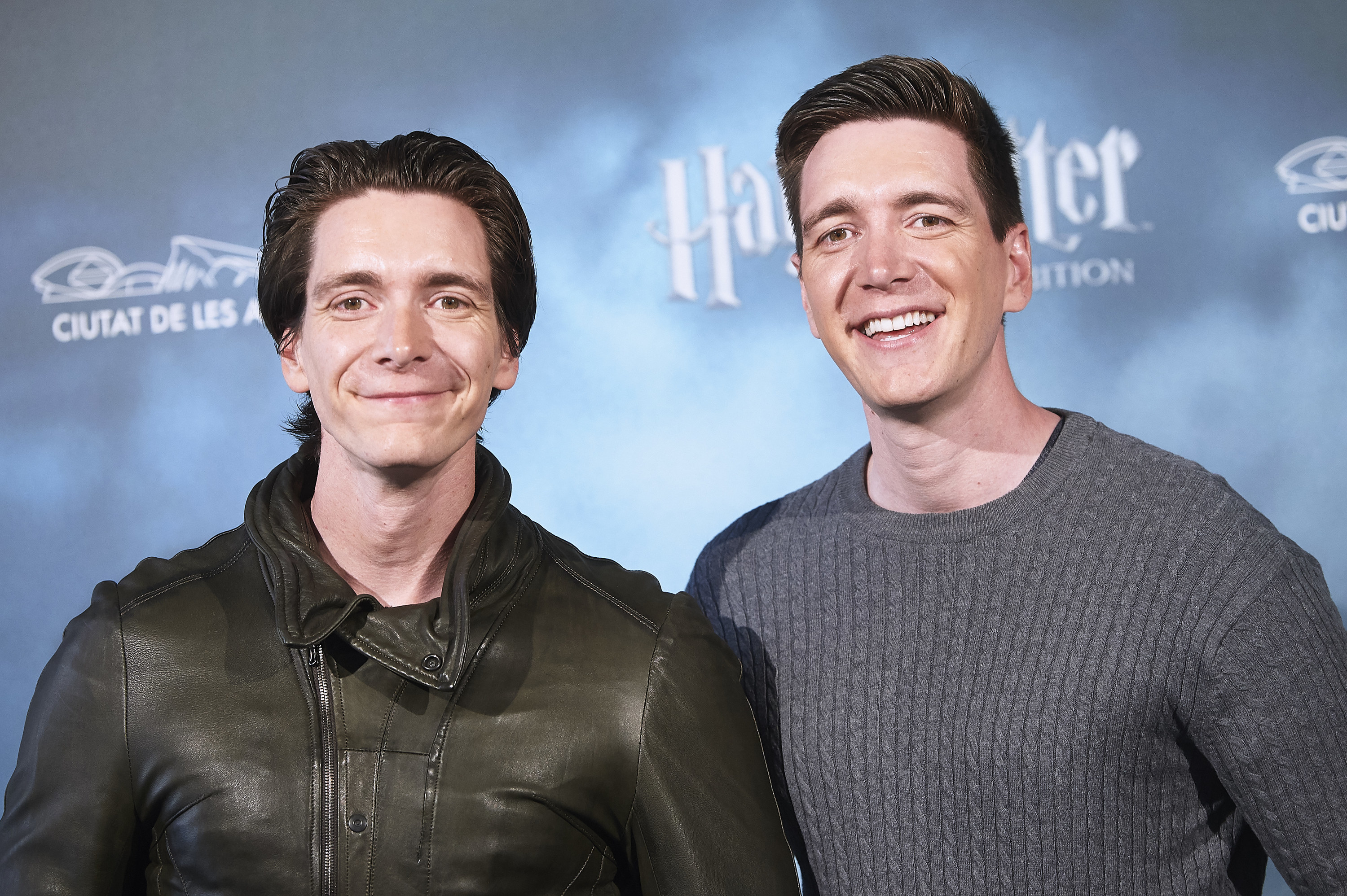 Oliver and James Phelps posing