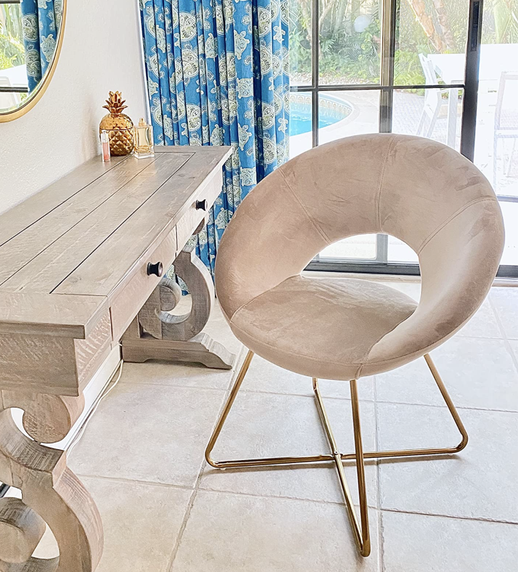 reviewer photo of the round velvet chair in beige