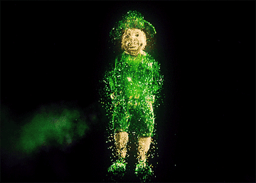A glittery leprechaun dances in front of a black background