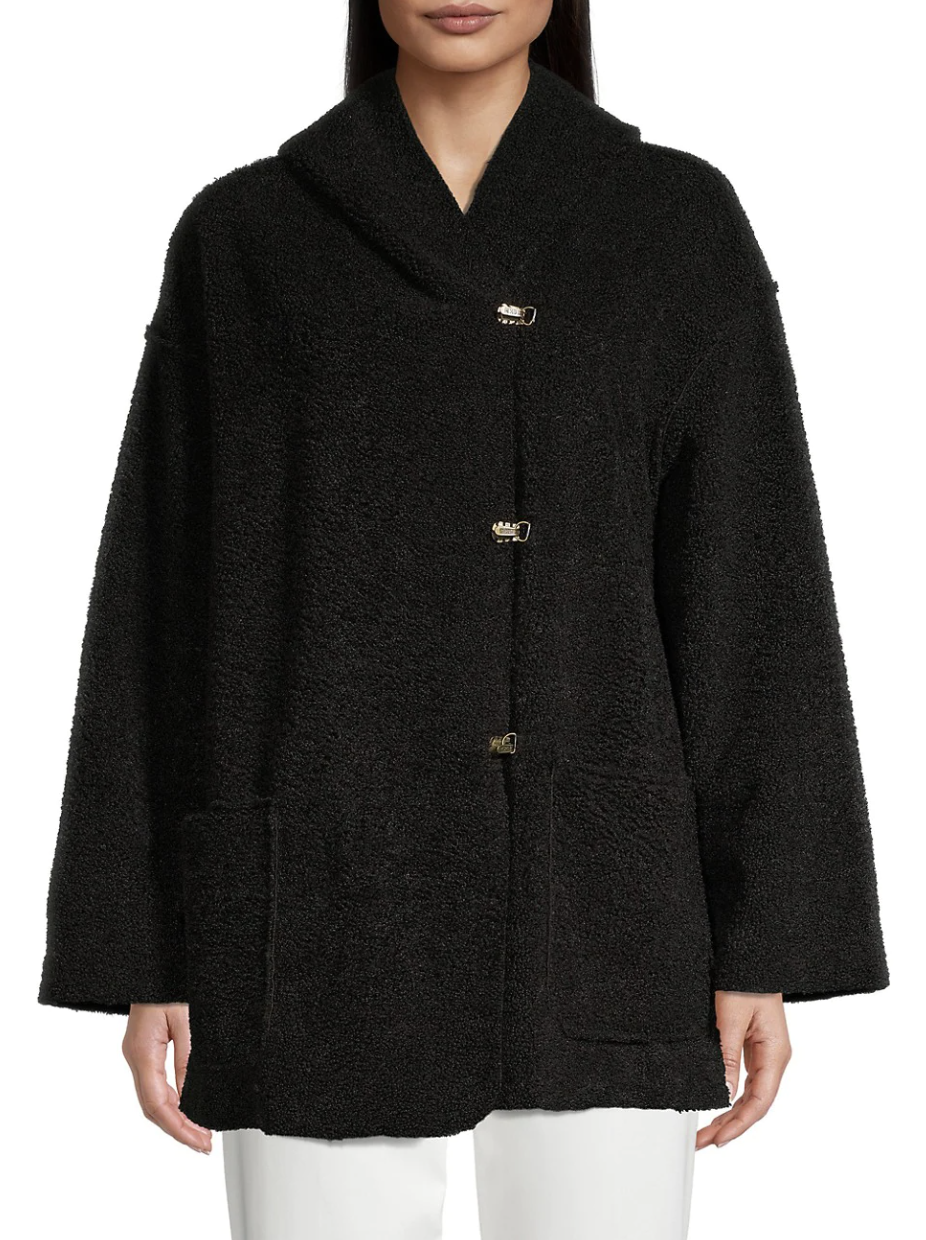 Model wearing hooded teddy coat