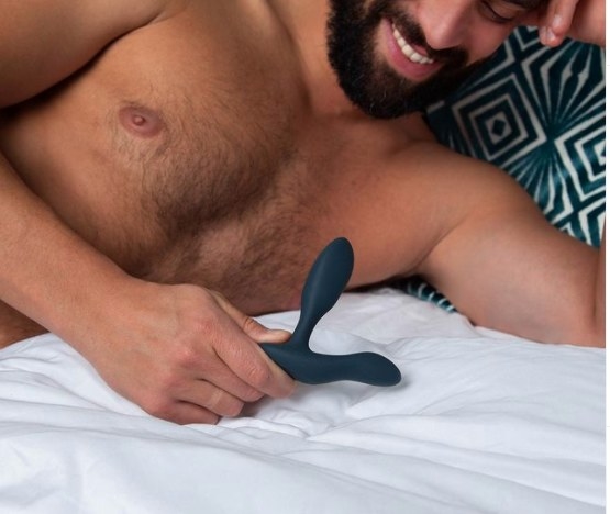 A model holding the massager