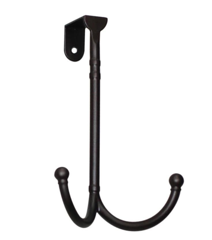 An over-the-door dark bronze double metal hook you can use to create more storage space
