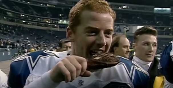 Jason Garrett bites a turkey leg