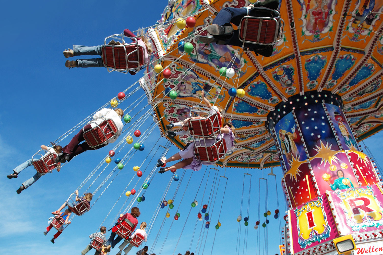 A flying carousel ride at an amusement park.