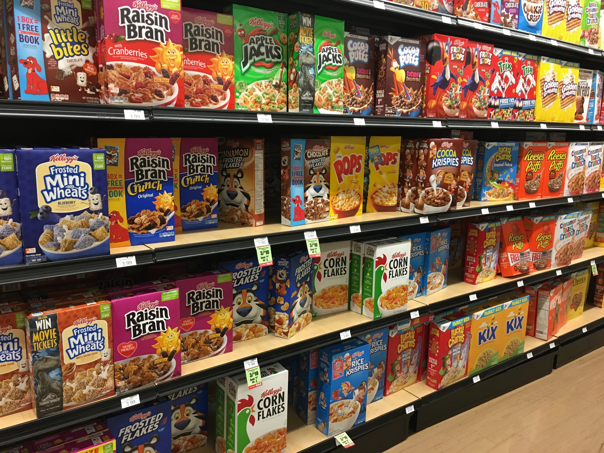 A cereal aisle at a grocery store.