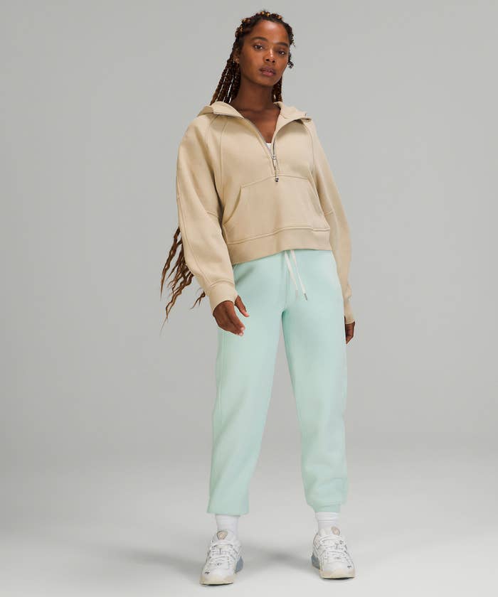 a model wearing the joggers in mint