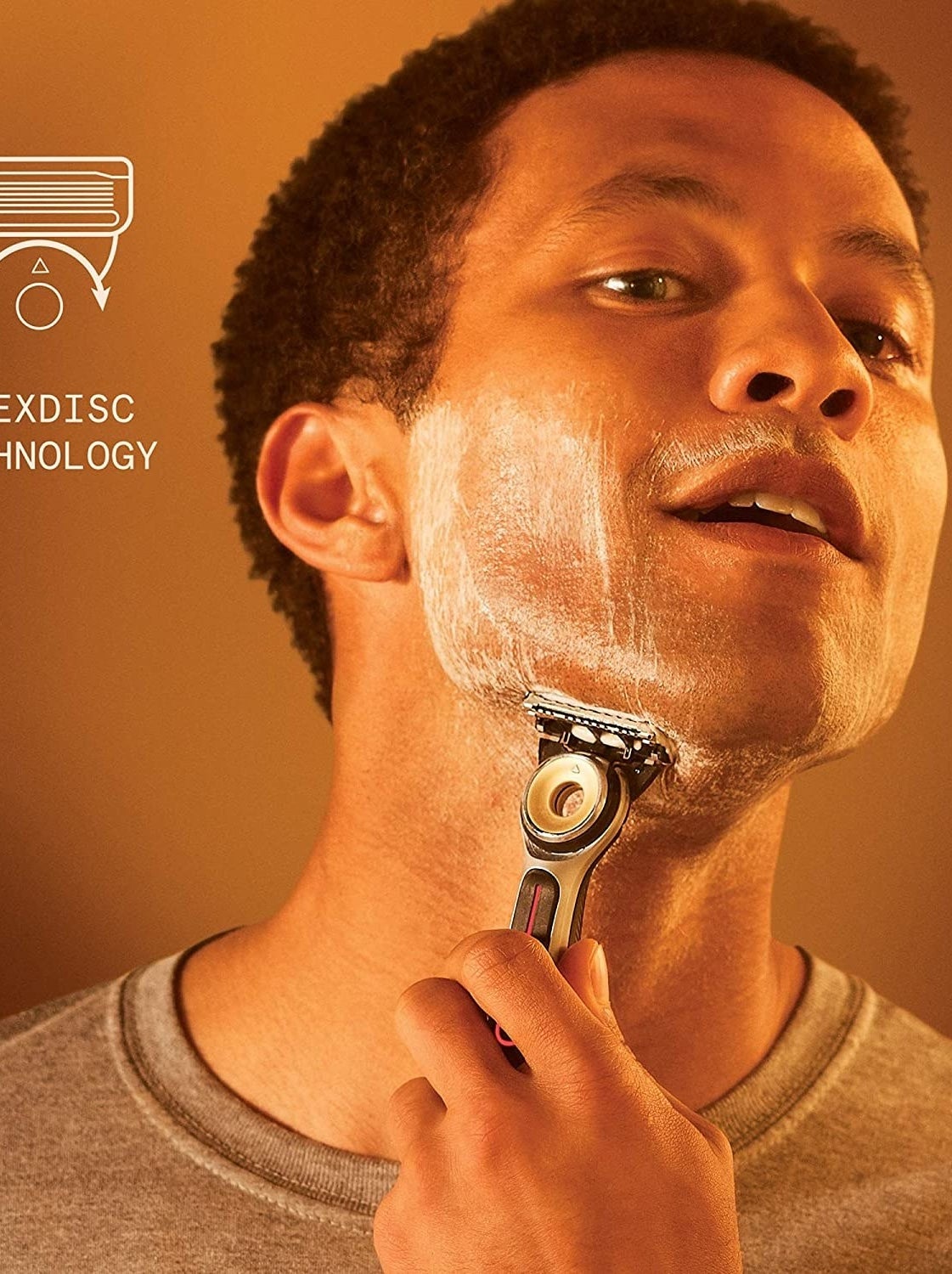 person shaving with the heated razor