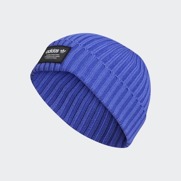 The blue beanie with a black adidas logo patch