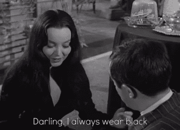 Gif of Morticia Addams in &quot;The Addams Family&quot; saying &quot;Darling, I always wear black&quot;