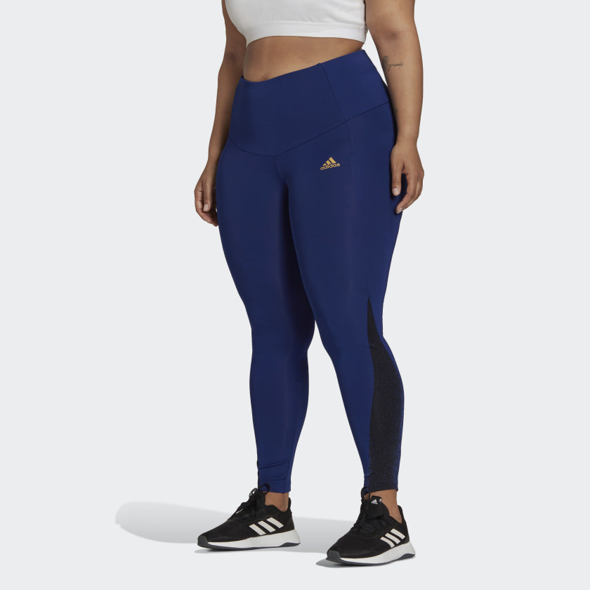 dark blue and black high-rise workout tights with stripe detail on the sides