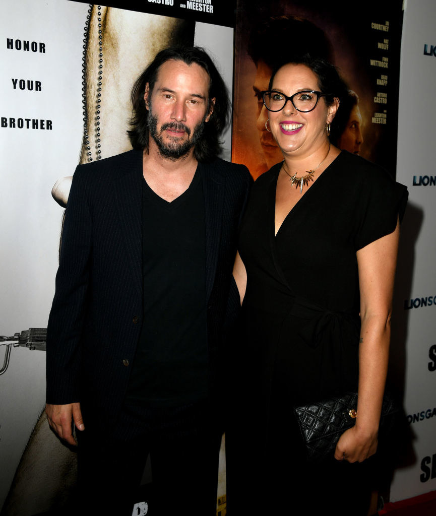 Keanu Reeves and Karina Miller arrive at the premiere of Lionsgate&#x27;s Semper Fi