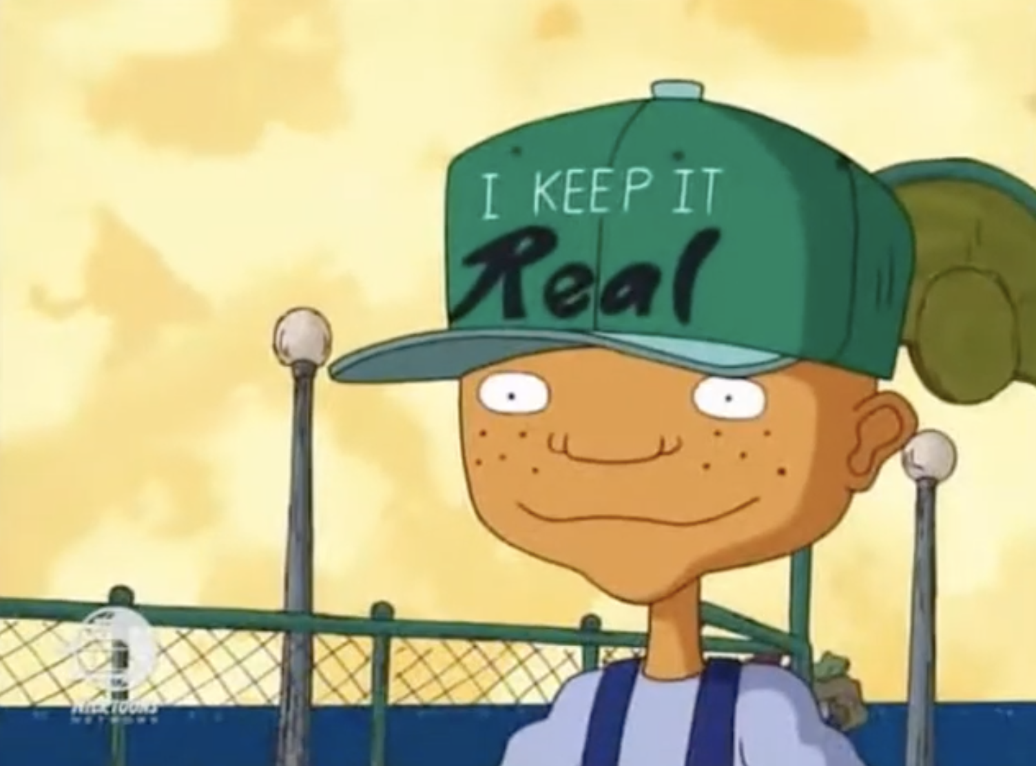 Maurice from Rocket Power with a hat that says &quot;I keep it real&quot;