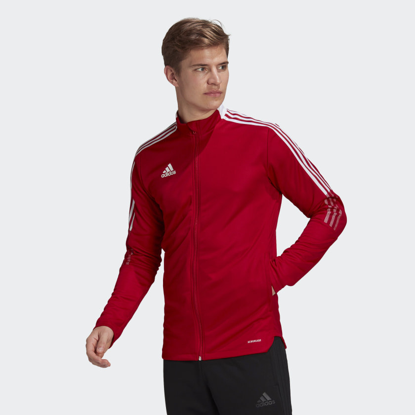 red adidas track jacket with white stripes on the side