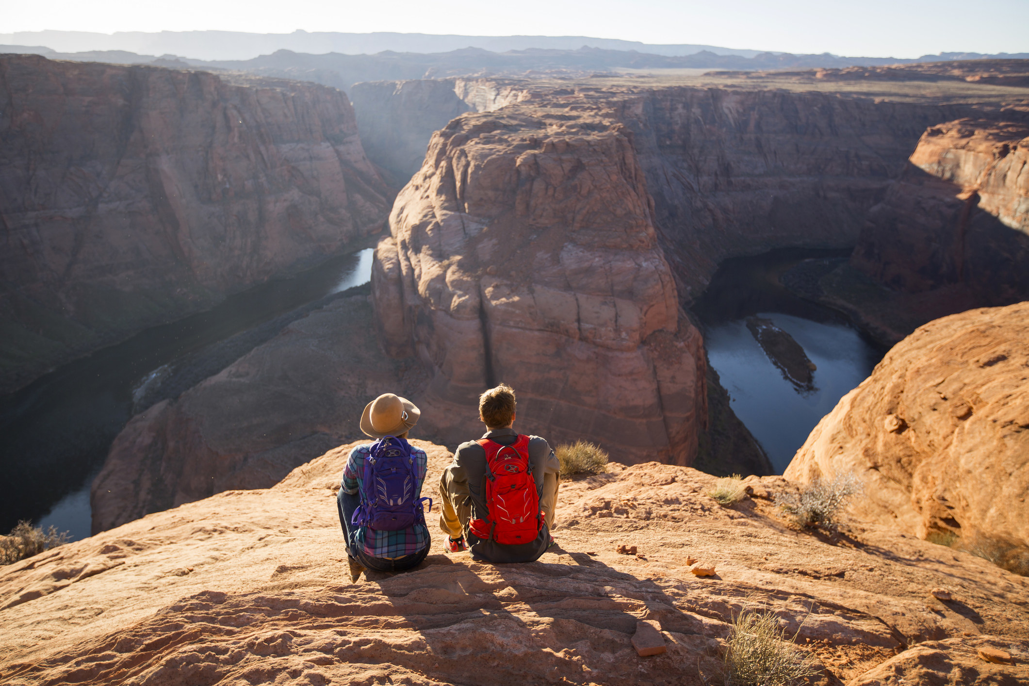 A couple looking out over the Grand Canyon