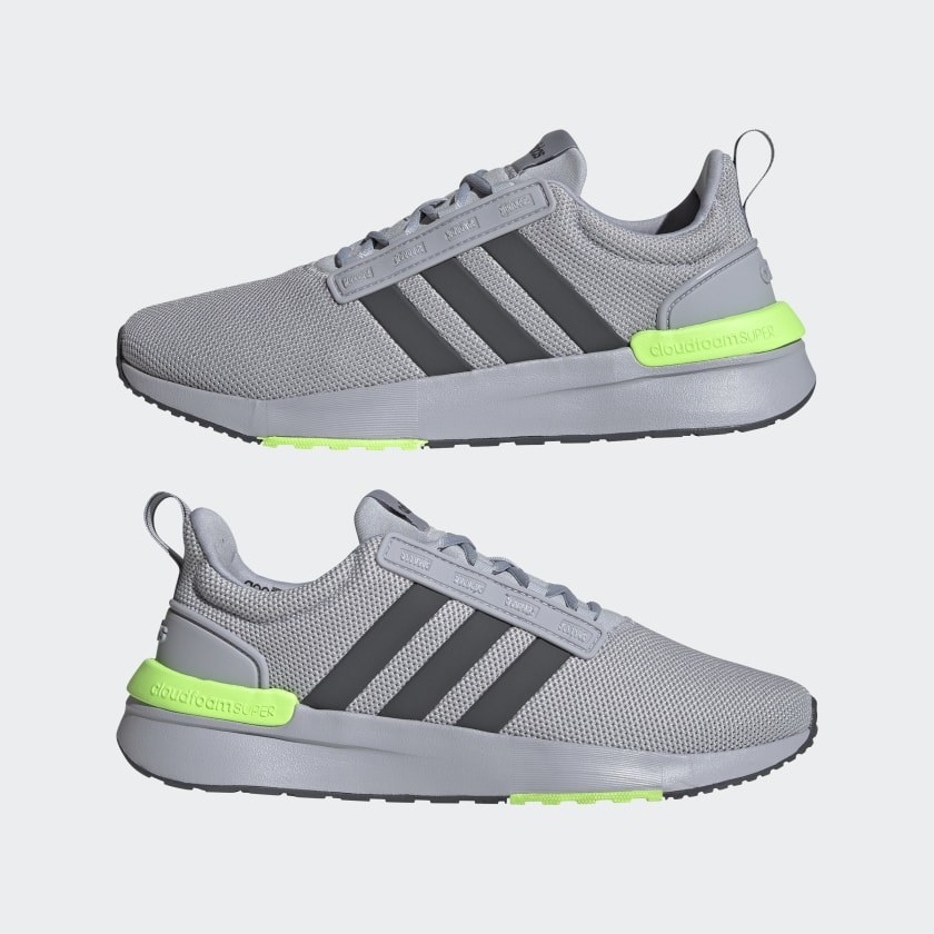 gray Adidas running sneakers with neon green detailing on the heel and sole