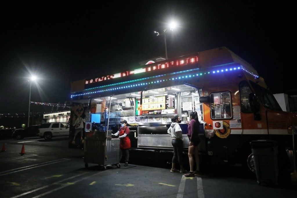 A taco truck at night