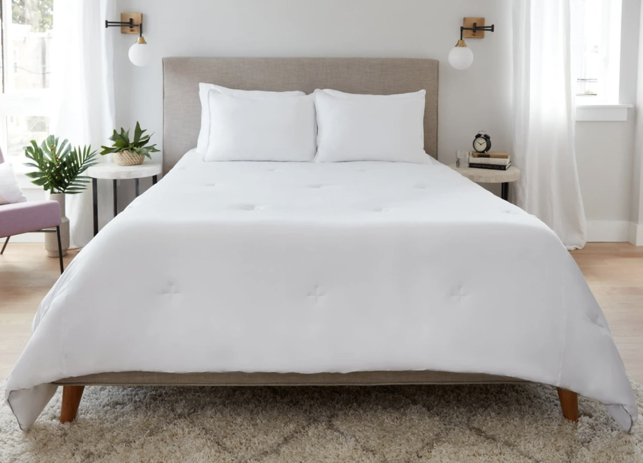 white comforter on a bed