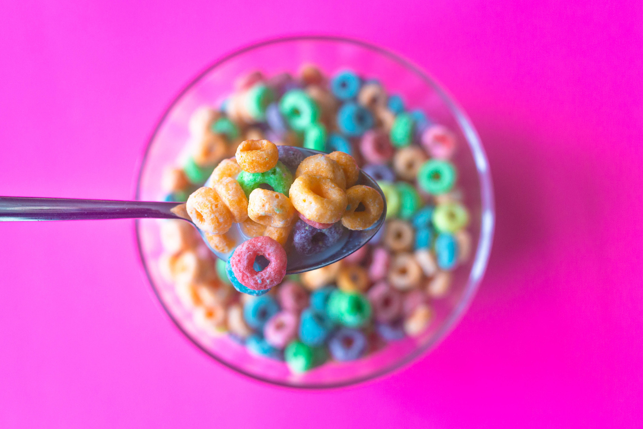 A bowl of Fruit Loops in milk.