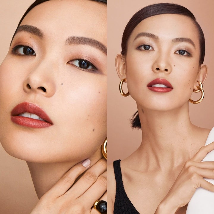 model wearing the pressed powder to give skin a glowy finish