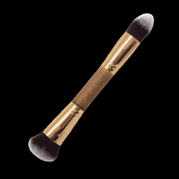 A gold dual-ended makeup brush