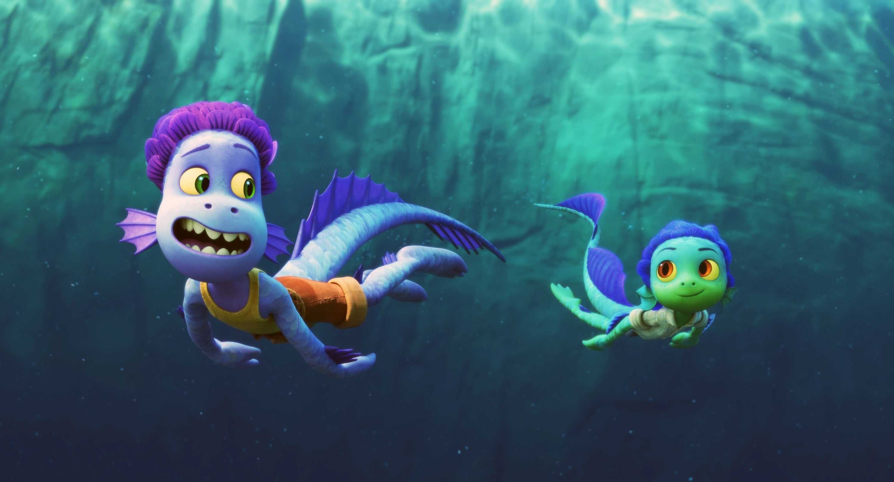 Alberto and Luca as sea monsters in water