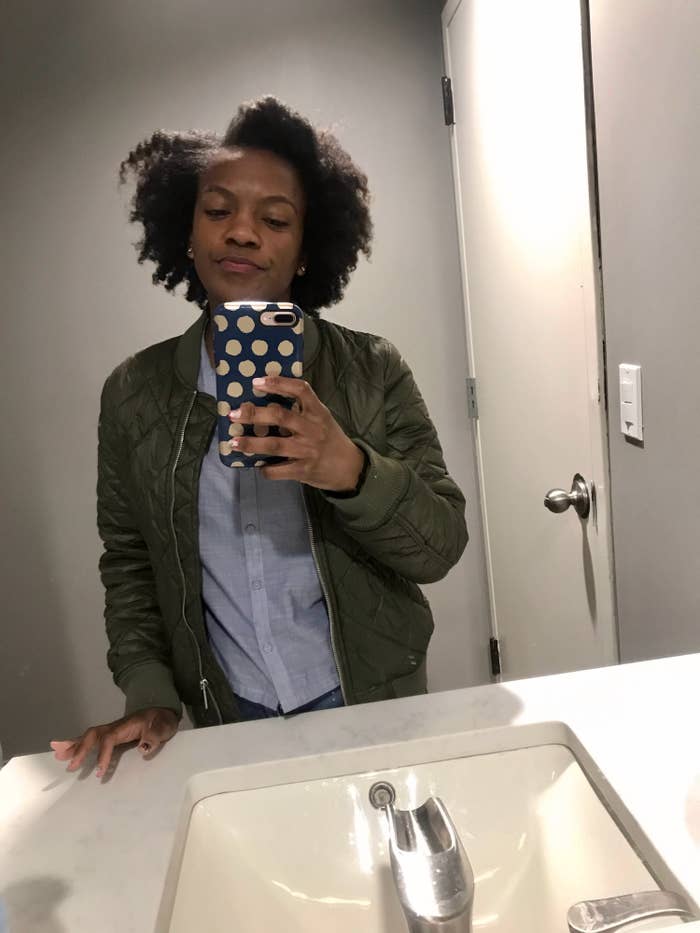 The author taking a selfie in the mirror