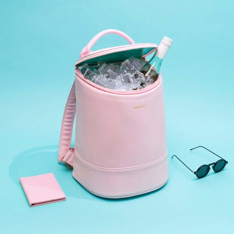 a light pink cooler back pack filled with ice