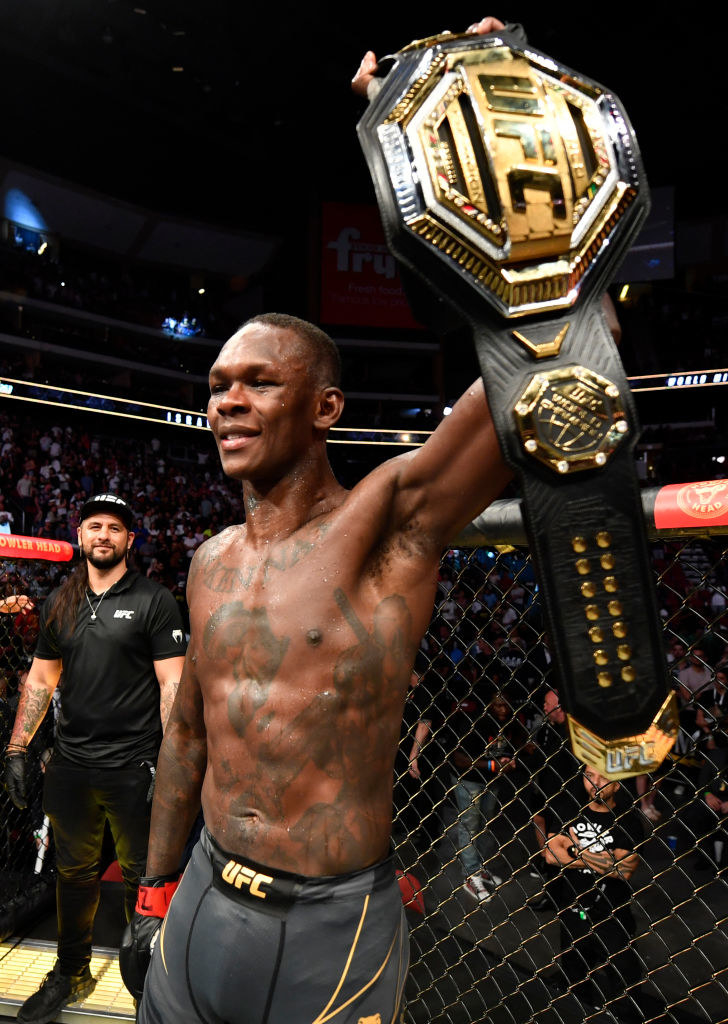 Israel Adesanya of Nigeria reacts after his victory over Marvin Vettori of Italy in their UFC middleweight championship fight during the UFC 263 event at Gila River Arena