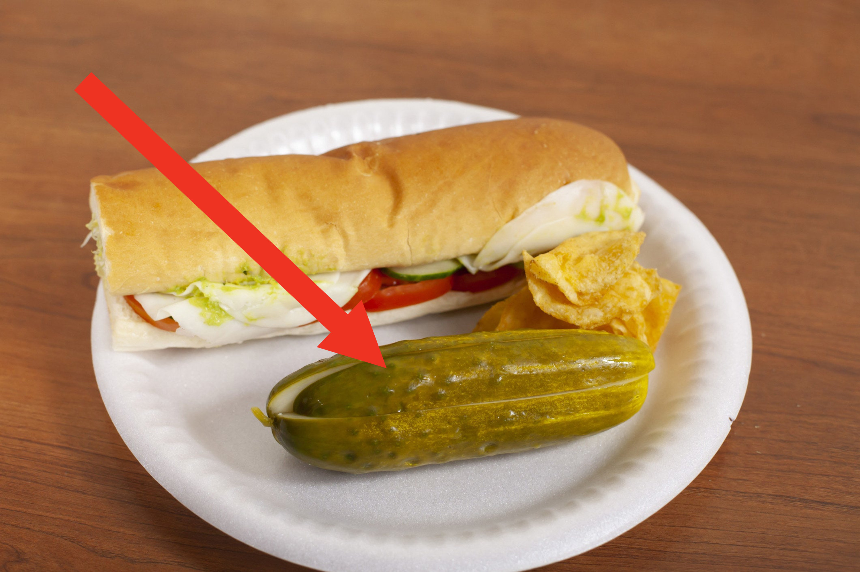 A sandwich with a pickle.
