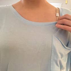 Reviewer photo of them wearing the nude bra under a t-shirt