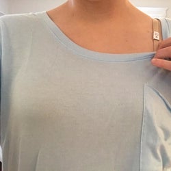 Reviewer photo of them wearing the nude bra under a t-shirt