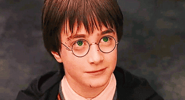 Harry Potter with bright green eyes.