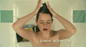 Emma Stone singing and washing her hair in the shower