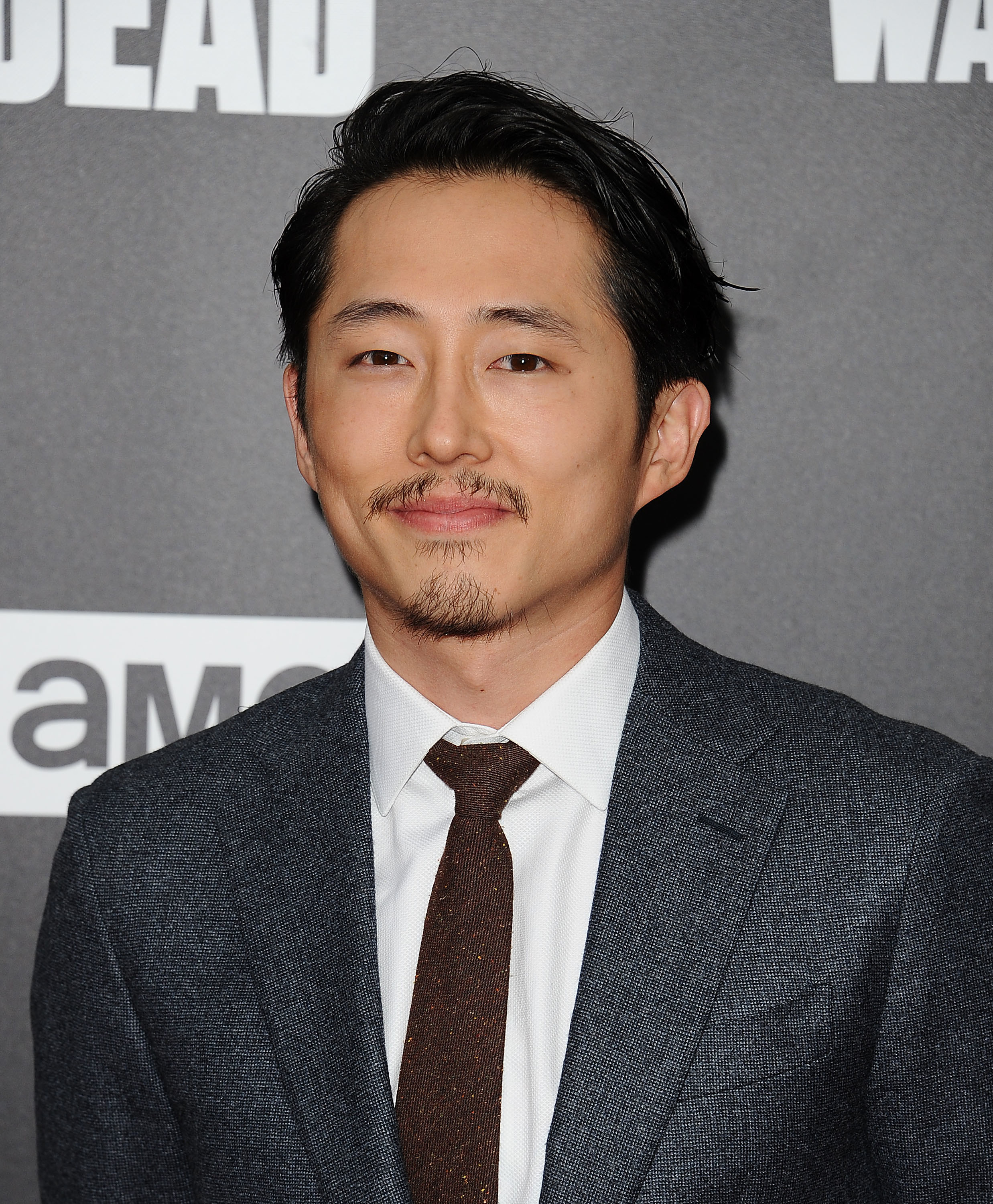 Steven Yeun on the red carpet