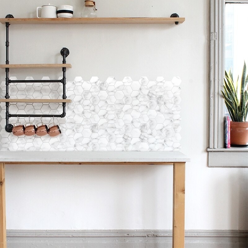 several white marble decal stickers on a kitchen wall