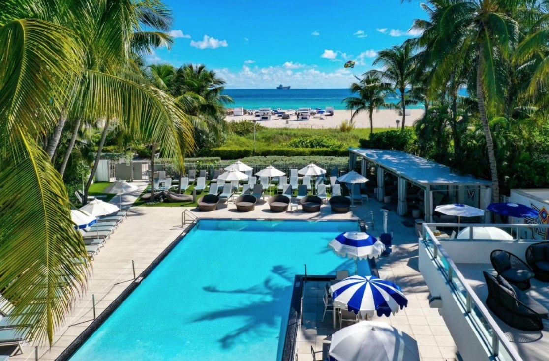 An image of the pool at the Sagamore Hotel South Beach from a balcony overlooking it