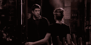 Ross kisses Rachel in Central Park as it rains outside