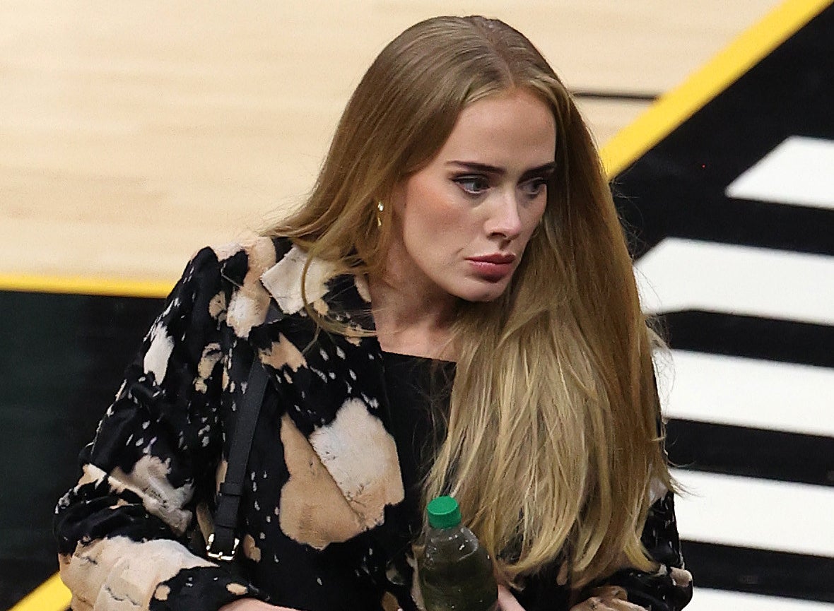 Adele looks serious while at an event