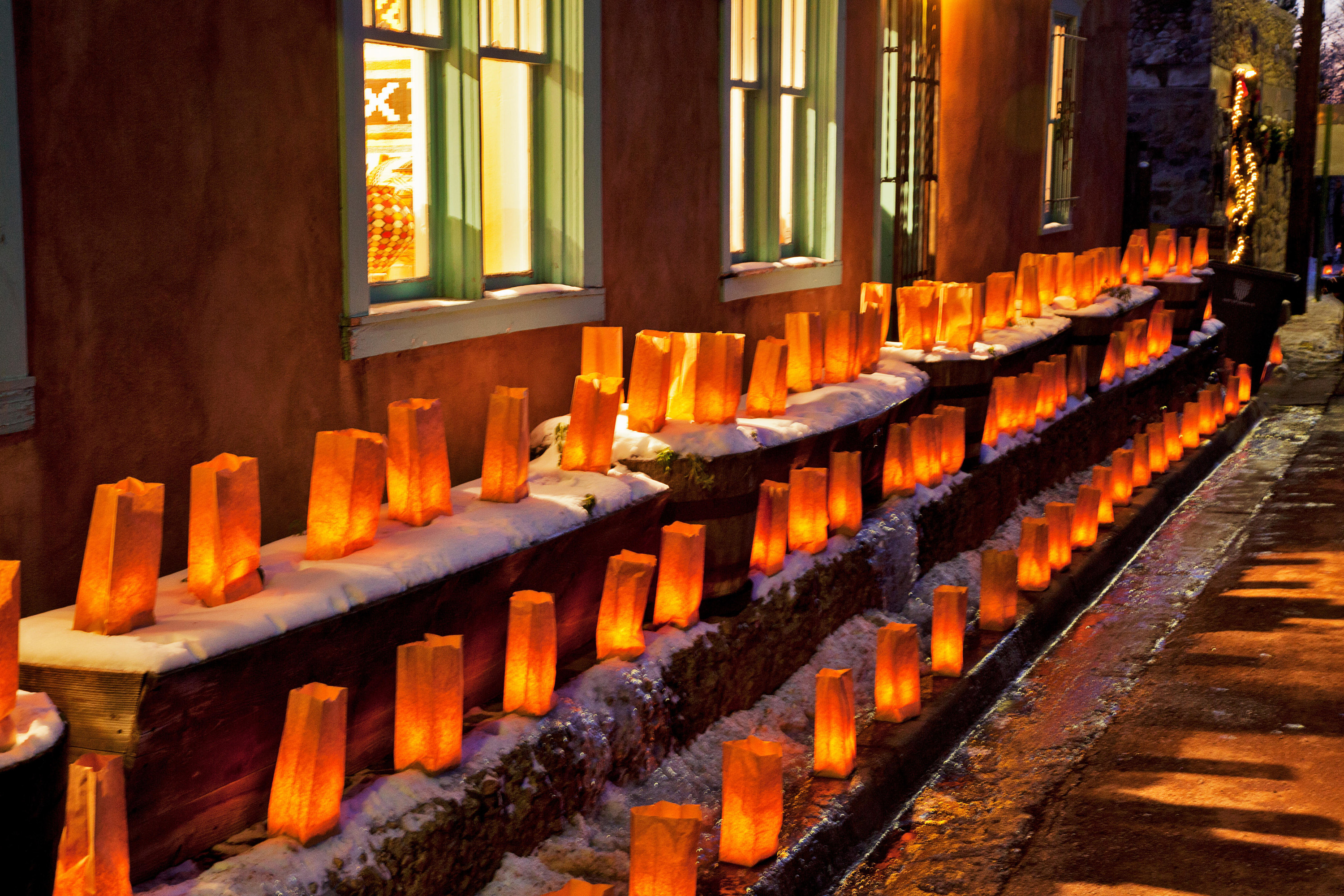 Luminarias lining the streets in Santa Fe during Christmastime
