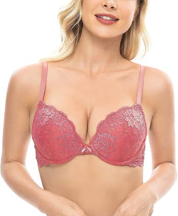 Model wearing pink push-up bra