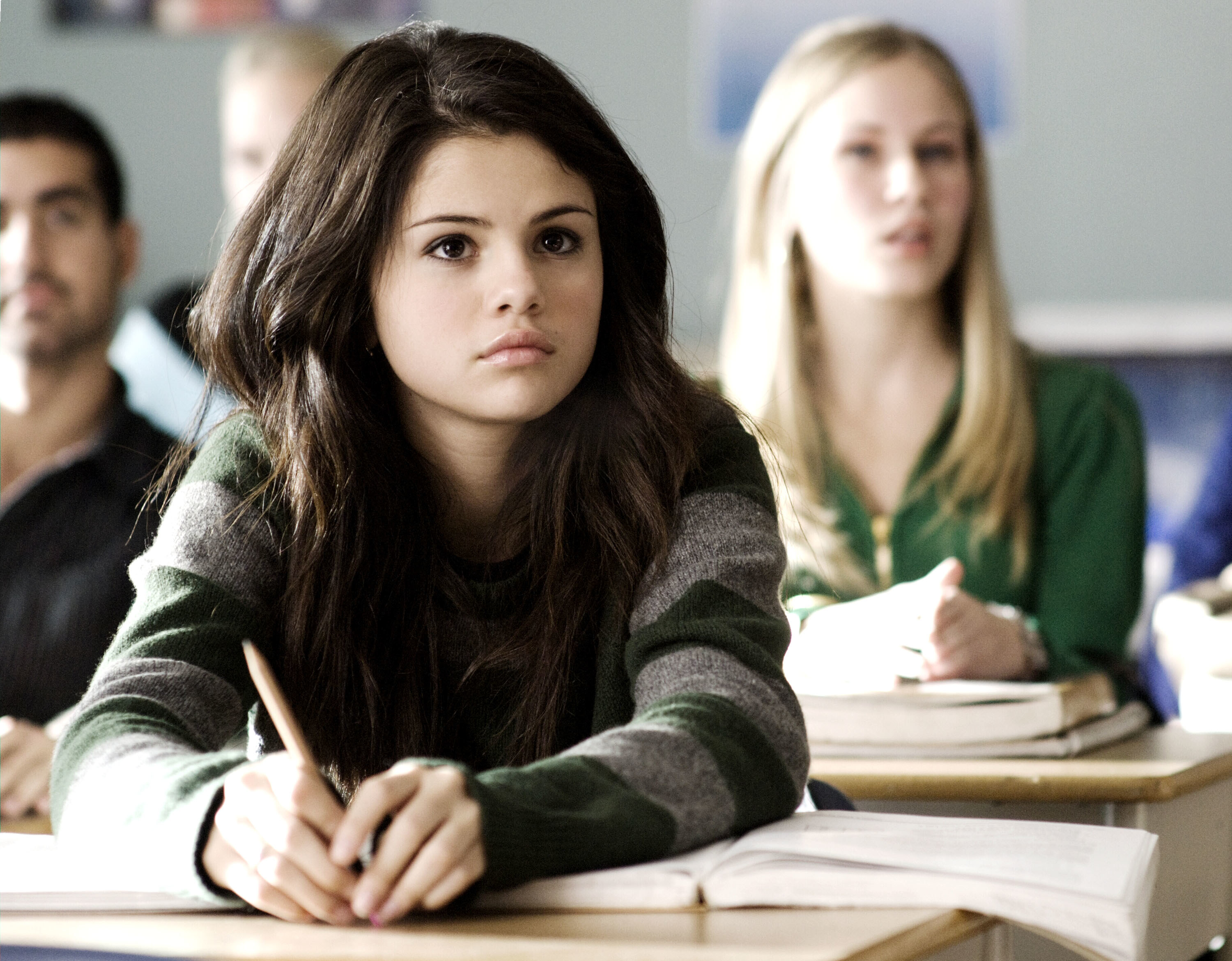 Selena in class in the film