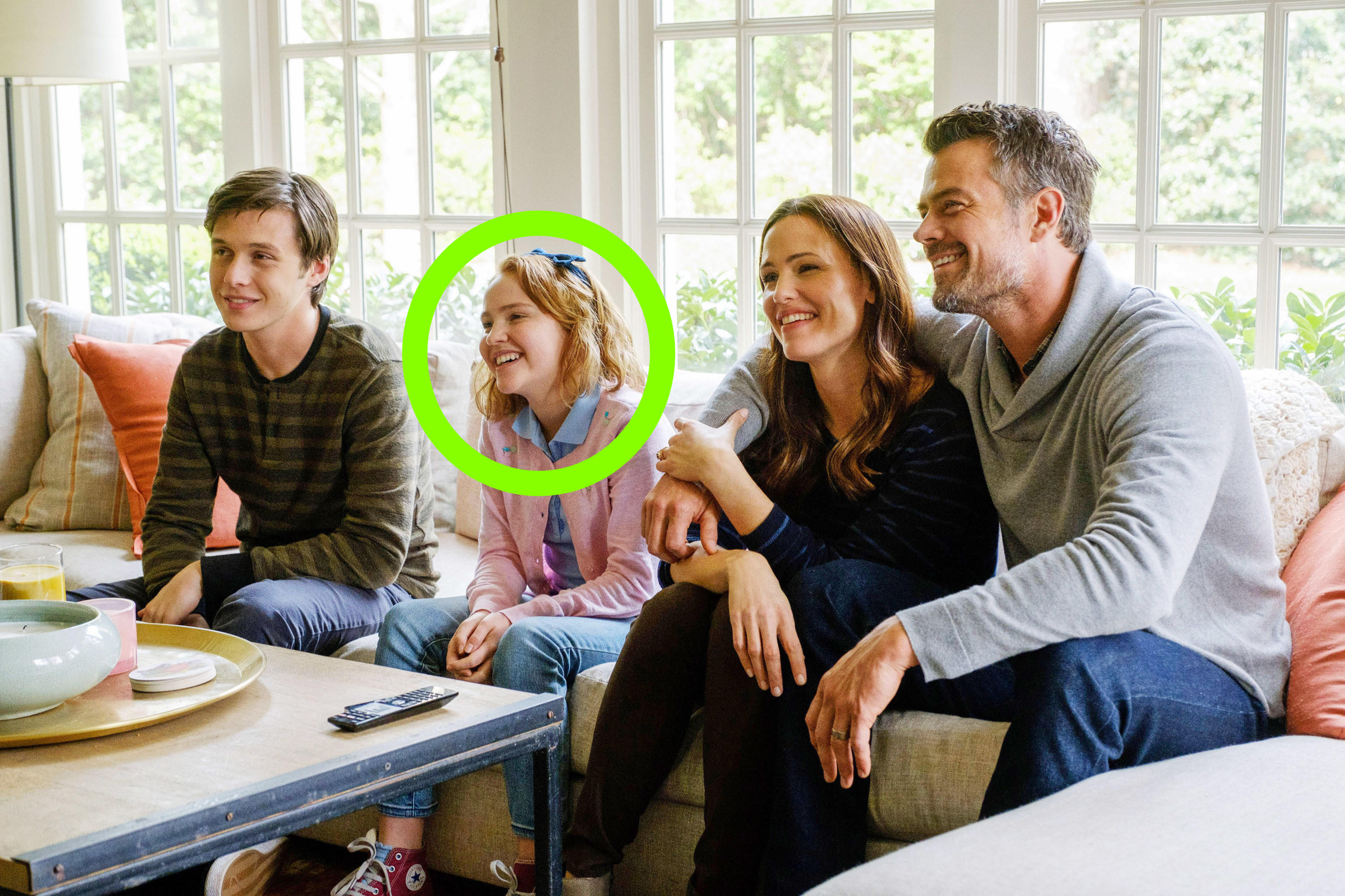 Simon and his family with his sister circled