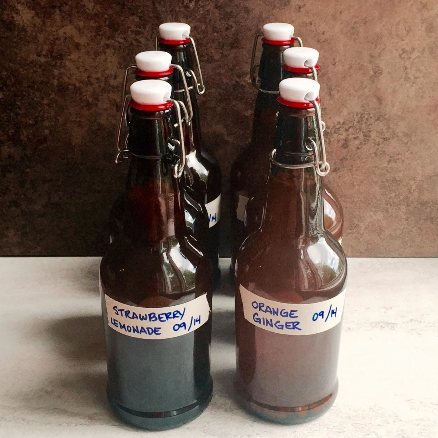 six bottles of DIY kombucha
