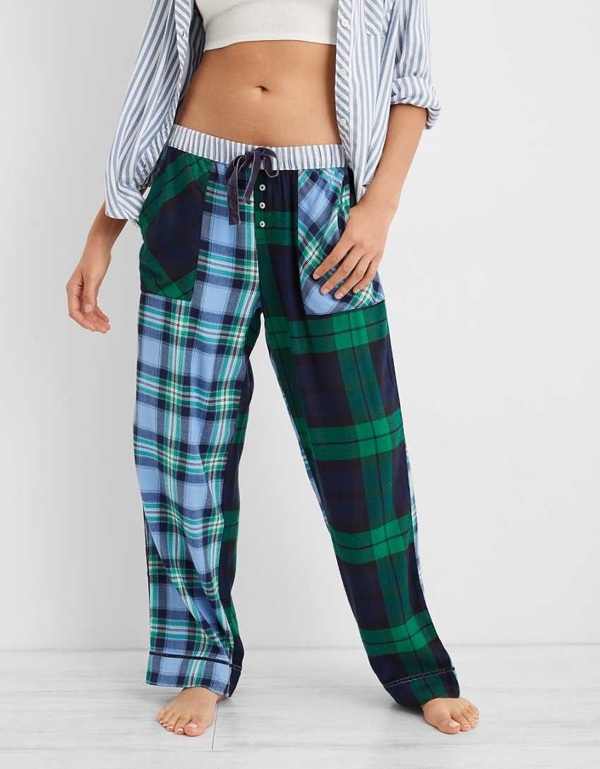 model wearing the mixed blue and green plaid print pajama pants